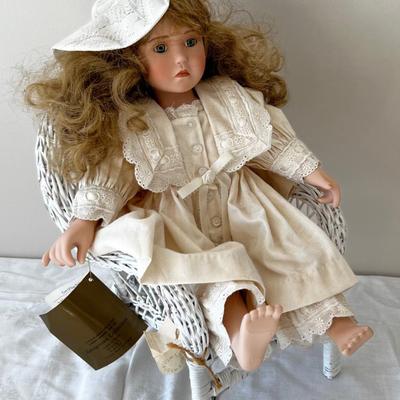 Beautiful Buttercup Porcelain Doll In Wicker Chair. 