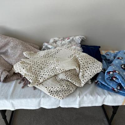 A Selection of Throws; Acrylic, Fleece, Etc.