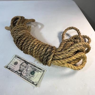 COIL OF OLD NATURAL FIBER ROPE - GUESSING ABOUT 35 FEET