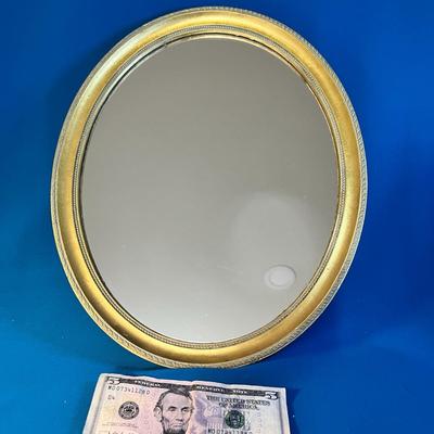 SMALL GOLD TONE FRAMED OVAL WALL MIRROR
