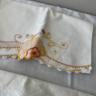 Orange Set of Embroider Pillow Cases. 