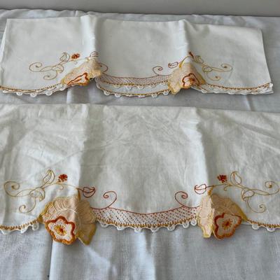 Orange Set of Embroider Pillow Cases. 