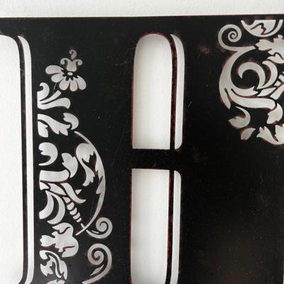 Metal "J H" Wall hangings
