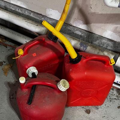 Garage 3 Gas Cans 1 is 1/2 Full