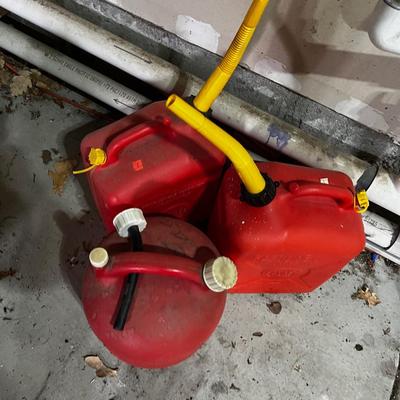 Garage 3 Gas Cans 1 is 1/2 Full