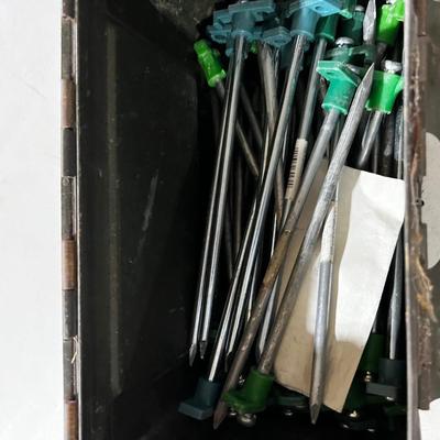 Garage: Tent Pegs ,,Rope and a Hammer in an old AMMO Box