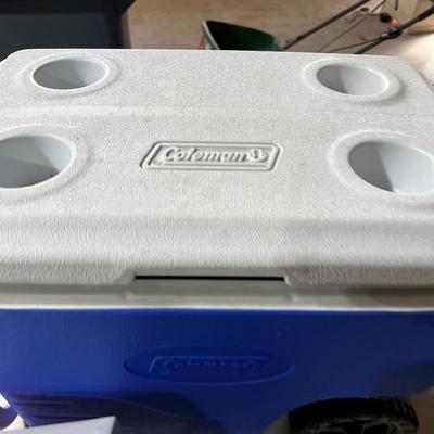 Garage 1 Coleman Cooler with Wheels and Handle Blue. Plus Play Mate PINK( inside)