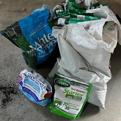Garage: Potting Soil and Grass Seed - Partial Bags. Opened