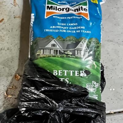 Garage Bag of Milo Nitrogen Fertilizer, Not opened but has a hole in it.