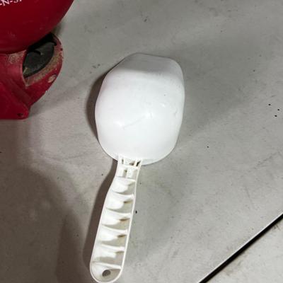 Garage Earthway Fertilizer Spreader and scoop