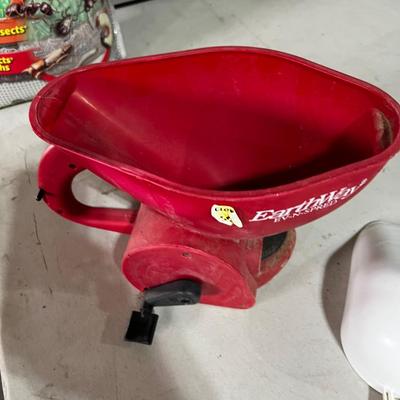Garage Earthway Fertilizer Spreader and scoop