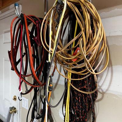 Garage Jumper Cable, Wire, Extension Cords (2 Piles Hanging up) 