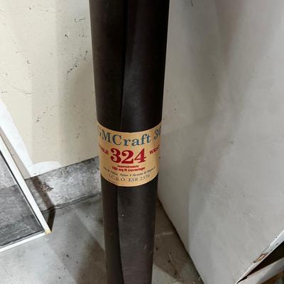 Garage ROLL OF ROOFING TAR PAPER. 