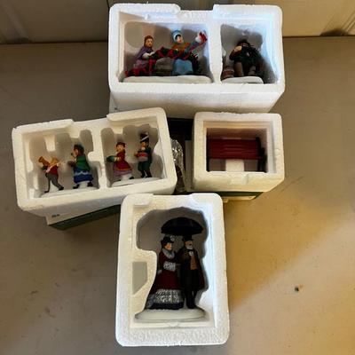 (4) Department 56 Figurines and benches in Original Boxes