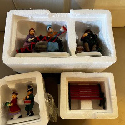 (4) Department 56 Figurines and benches in Original Boxes