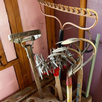 Cultivator and Hose includes Plastic Organizing Stand. 