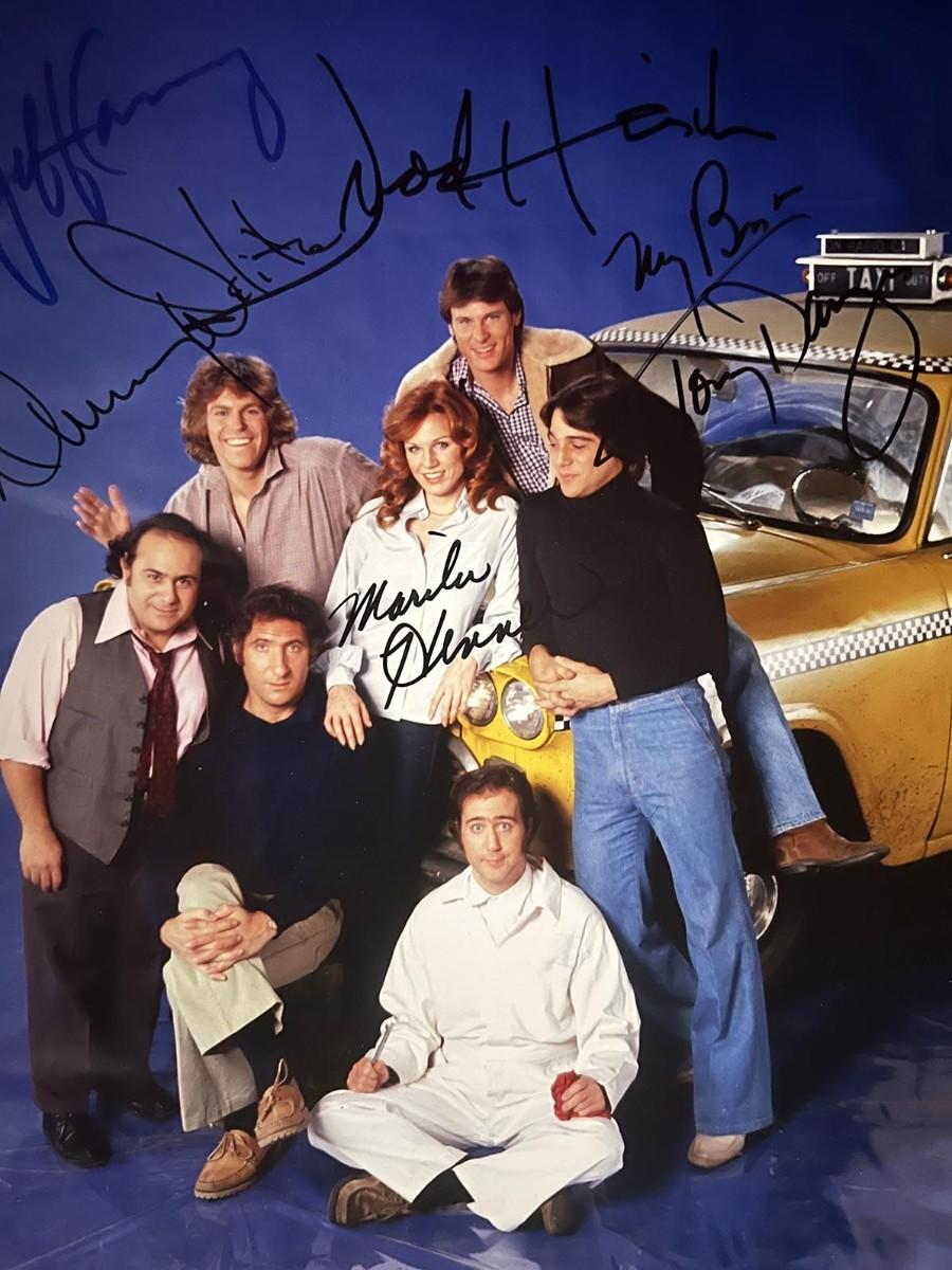 Taxi cast signed photo | EstateSales.org
