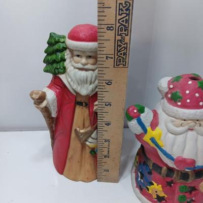 Two ceramic Santa's - candle holder and figure