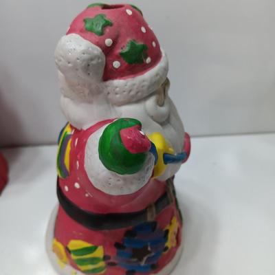 Two ceramic Santa's - candle holder and figure