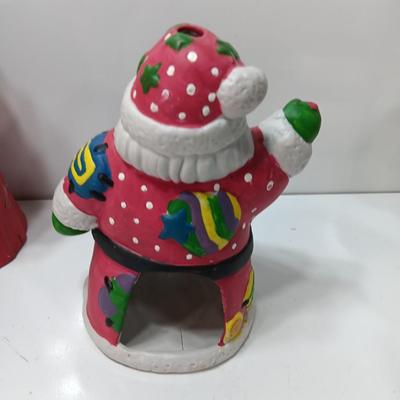 Two ceramic Santa's - candle holder and figure