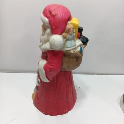 Two ceramic Santa's - candle holder and figure