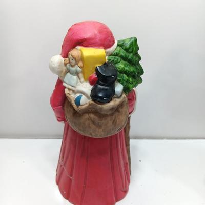 Two ceramic Santa's - candle holder and figure