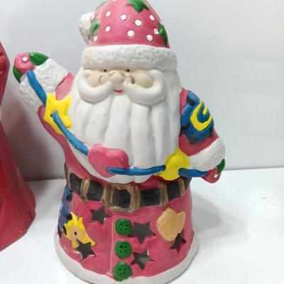 Two ceramic Santa's - candle holder and figure