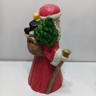 Two ceramic Santa's - candle holder and figure