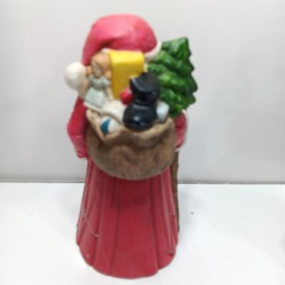 Two ceramic Santa's - candle holder and figure