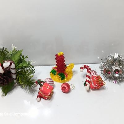Vintage plastic greenery / decorative florals Candy Cane with candle made of beads.