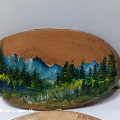 Two hand painted Colorado scenery ornaments on wood and two other Christmas ornaments with pine cones