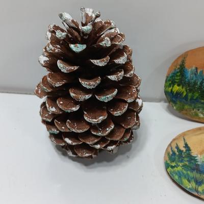 Two hand painted Colorado scenery ornaments on wood and two other Christmas ornaments with pine cones