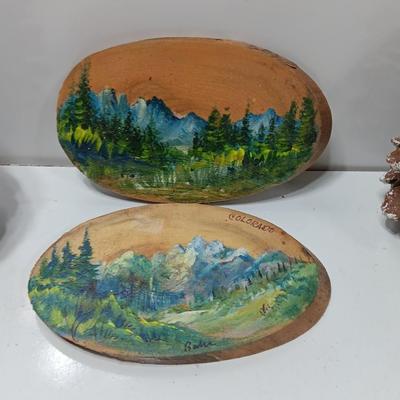 Two hand painted Colorado scenery ornaments on wood and two other Christmas ornaments with pine cones