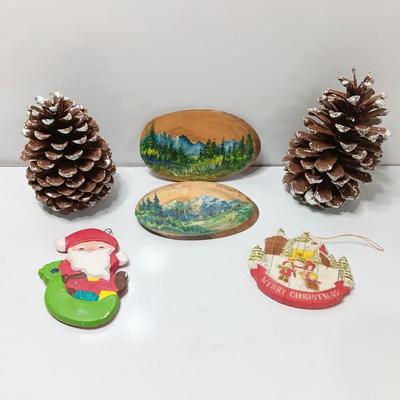 Two hand painted Colorado scenery ornaments on wood and two other Christmas ornaments with pine cones