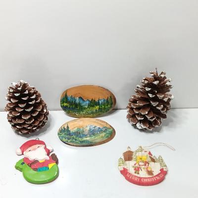 Two hand painted Colorado scenery ornaments on wood and two other Christmas ornaments with pine cones