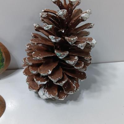 Two hand painted Colorado scenery ornaments on wood and two other Christmas ornaments with pine cones