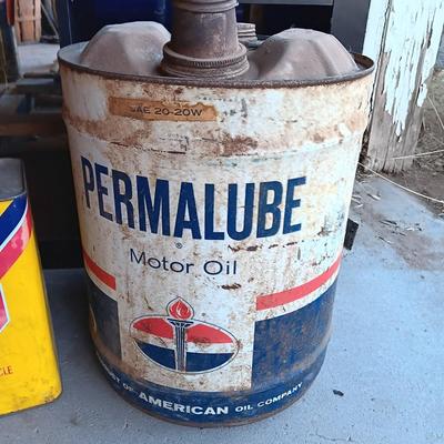 Metal collectible Permalube motor oil can and Prestone Brake Fluid tin