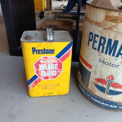 Metal collectible Permalube motor oil can and Prestone Brake Fluid tin