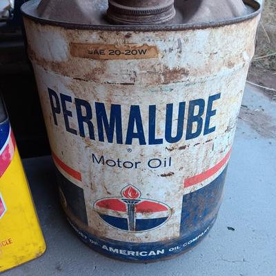 Metal collectible Permalube motor oil can and Prestone Brake Fluid tin