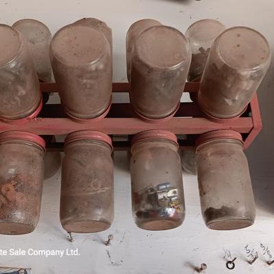 Two hardware organizers with some hardware