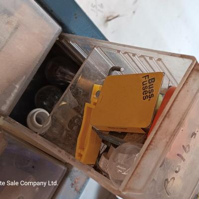 Two hardware organizers with some hardware