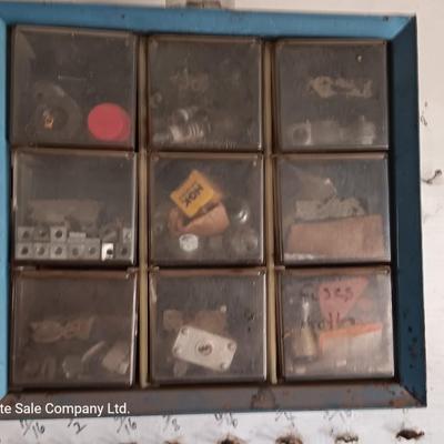 Two hardware organizers with some hardware