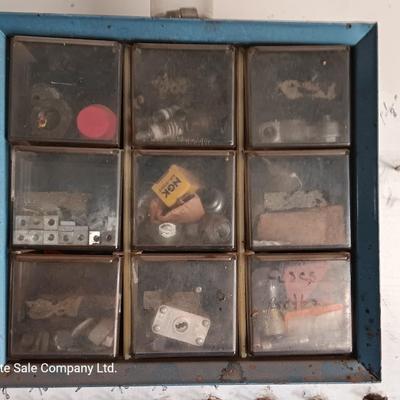 Two hardware organizers with some hardware