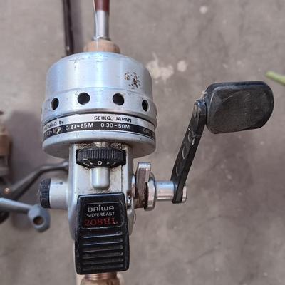 Two nice fishing poles with reels - Pack Rod - and CW 300