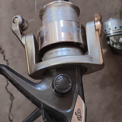 Two nice fishing poles with reels - Pack Rod - and CW 300