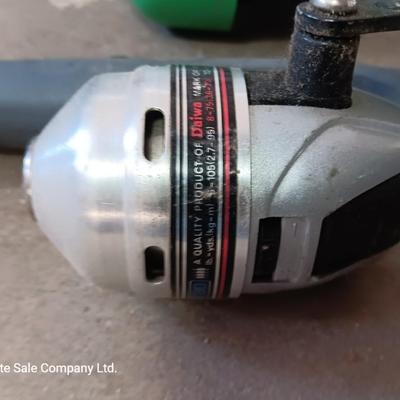 Two nice fishing poles with reels - Daiwa & Green unmarked pole