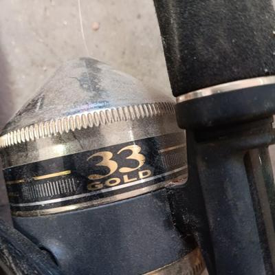 Two nice fishing poles with reels - Zebco Classic & Shakespeare Contender