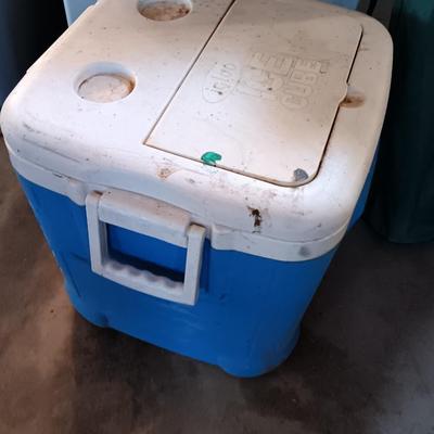 Camping cooler and folding chair with cover