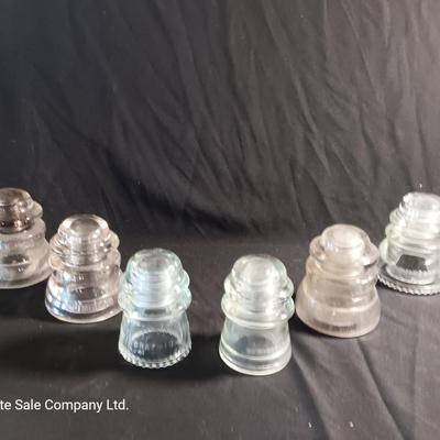 Four clear Glass Insulators - Hemingray & Dominion