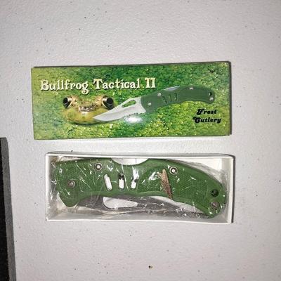 New Bullfrog tactical II with etched wolf on tile and two other smaller pocketknives